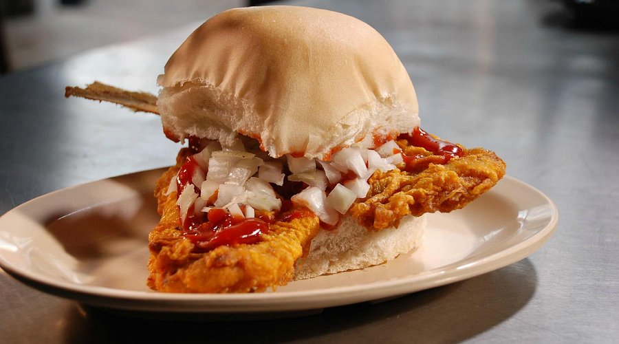 La Camaronera signature dishes The OG Minuta SandwichCamaronera SandwichConch Fritters